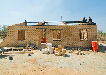 A brick home being built